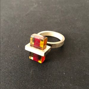 Silver and multi-colored (red & yellow) glass ring